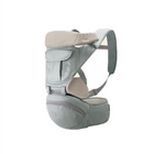 Grey baby carrier with shoulder harness and hip seat